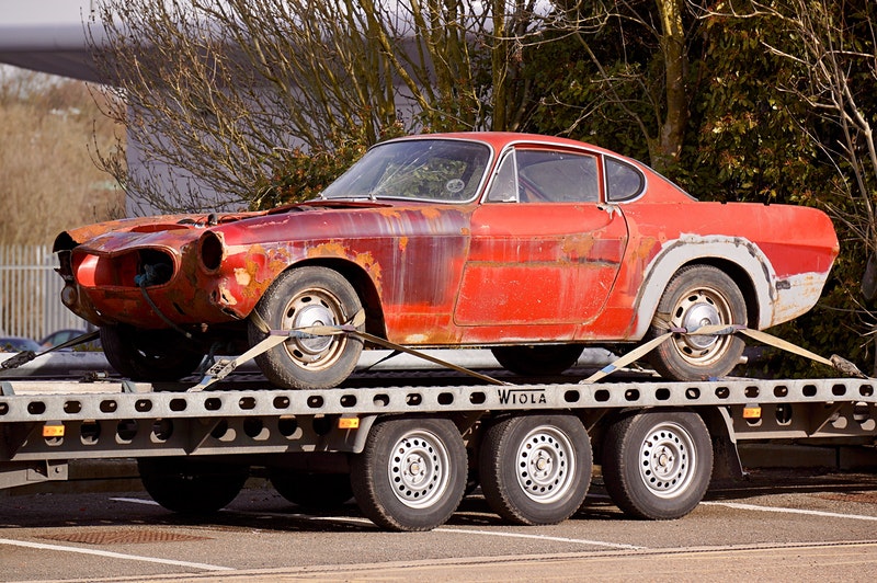 red-coupe-on-flatbed-trailer-943930